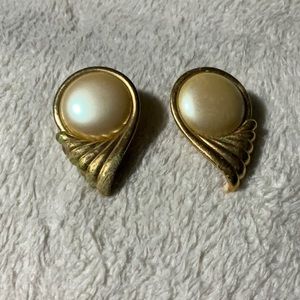Very vintage Earrings, not clip on. YSL. Not gold